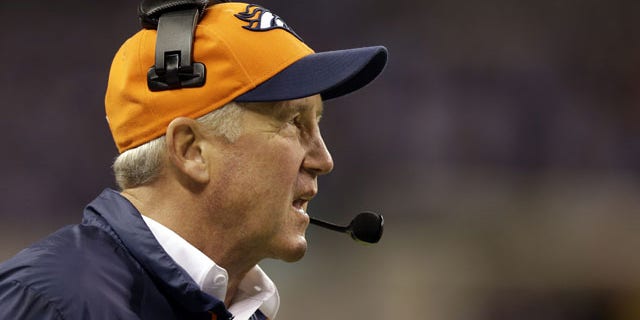 Denver Broncos head coach John Fox watches during the first half of an NFL football game against the Indianapolis Colts, Sunday, Oct. 20, 2013, in Indianapolis. (AP Photo/Michael Conroy)