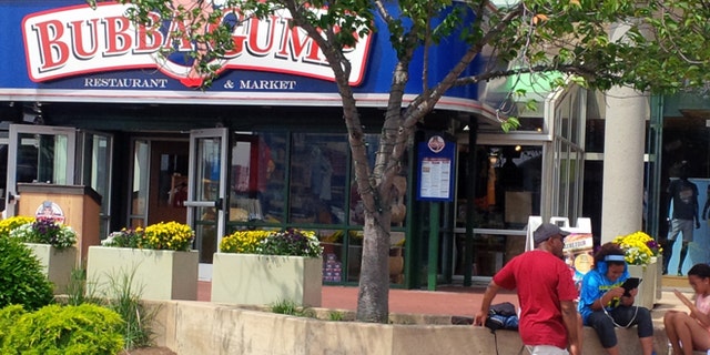 May 27, 2015: A family takes a break on a hot day while visiting Harborplace in Baltimore, Md.