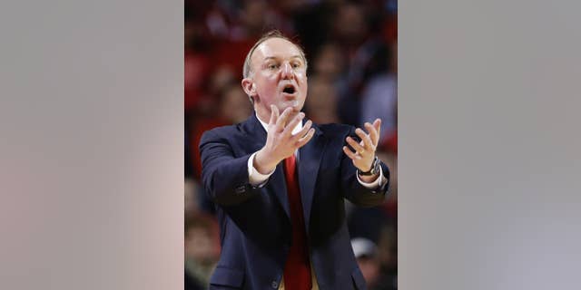 FILE - In this Jan. 20, 2014, file photo, Ohio State coach Thad Matta calls instructions in the first half of an NCAA college basketball game against Nebraska in Lincoln, Neb. There’s not a lot of talk about the latest version of the Ohio State’s men’s basketball team as it begins preseason practice. About all anyone would know for certain about coach Thad Matta’s 11th Buckeyes squad is who is not on it: point guard Aaron Craft and leading-scorer LaQuinton Ross. (AP Photo/Nati Harnik, File)
