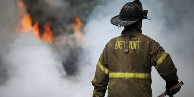 A simple garage fire gets complicated with wires down. Detroit, 2009.