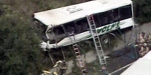 Sept. 29, 2010: This image taken from video provided by WJLA shows a bus after crashing along I-270 in Bethesda, Md.. Maryland State Police say the commuter bus plunged off a highway outside the nation's capital.