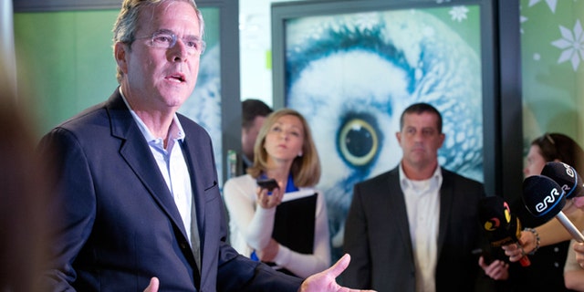 Former US Governor of Florida Jeb Bush speaks to journalists at the e- Estonia Showroom during his visit in Tallinn, Estonia, Saturday, June 13, 2015. Bush visits Estonia, a once-bleak Soviet state that now has a growing, free-market economy. If he was trying to stoke memories of his father and his legacy as president, Bush appears to have largely succeeded. (AP Photo/Liis Treimann)