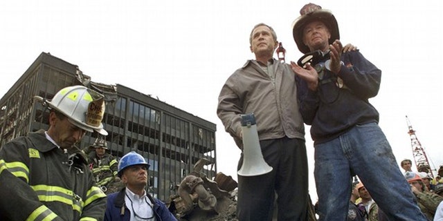 Sept. 14, 2001: President George W. Bush addresses rescue workers at Ground Zero