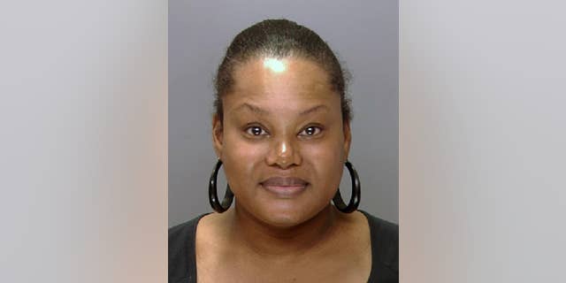 FILE - This undated file photo provided by the Philadelphia Police Department shows Padge Gordon, also known as Padge Victoria Windslowe. An aspiring rapper known as "the Black Madam," Windslowe is accused of killing a 20-year-old dancer from London during a procedure that involved silicone buttocks injections and Krazy Glue. Her third-degree murder trial is expected to start Thursday, Feb. 19, 2015 in Philadelphia Common Pleas Court. (AP Photo/Philadelphia Police Department, File)