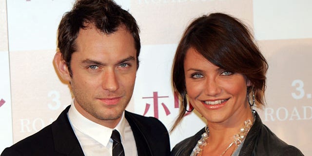 TOKYO - MARCH 14: Actress Cameron Diaz and actor Jude Law attend a photo call and press conference to promote their latest film "The Holiday" at Park Tower Hall on March 14, 2007 in Tokyo, Japan.