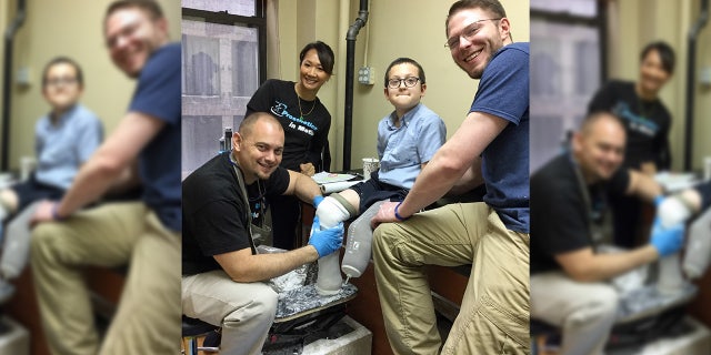 In the video, the adorable bespectacled boy gleefully races staffers in the office.
