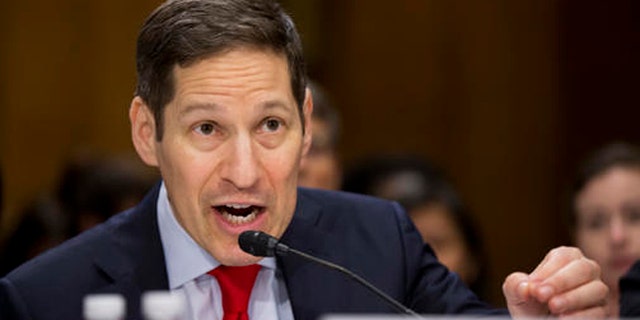 In this photo taken July 13, 2016, Centers for Disease Control and Prevention Director Tom Frieden testifies on Capitol Hill in Washington, Frieden, the head of the government's fight against the Zika virus said that "we are now essentially out of money" and warned that the country is "about to see a bunch of kids born with microcephaly" in the coming months. The warning came as lawmakers start to sort out a stopgap government funding bill that is being targeted to also carry long-delayed money to battle Zika. (AP Photo/Manuel Balce Ceneta)