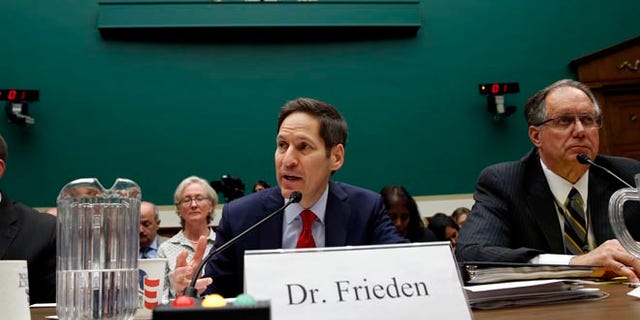 U.S. Centers for Disease Control and Prevention (CDC) Director Tom Frieden testifies at a House Energy and Commerce Subcommittee on Oversight and Investigations hearing called the "Review of CDC Anthrax Lab Incident" on Capitol Hill in Washington July 16, 2014. Flanking Frieden are Joseph Henderson (L), deputy director of the CDC's Office of Security and Emergency Preparedness, and Jere Dick, associate deputy administrator of the Animal and Plant Health Inspection Services at the U.S. Department of Agriculture.