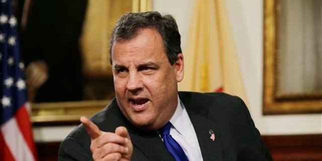 New Jersey Gov. Chris Christie reacts to a question in Trenton, N.J., Friday, Dec. 13, 2013, after he announced that Deborah Gramiccioni would replace Bill Baroni as executive deputy director of Port Authority of New York and New Jersey. Baroni, one of Christie's top appointees, resigned Friday amid an escalating probe into ramp closings on a bridge into New York City. The resignation of Baroni comes a day after the Democratic National Committee tried to link Christie, a Republican, to the controversy and a state lawmaker issued seven subpoenas to Baroni and other agency officials. Christie said he was certain the shutdowns were not politically motivated. (AP Photo/Mel Evans)