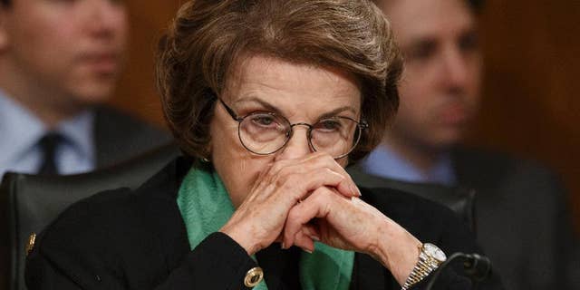 File- This March 13, 2014, file photo shows Senate Intelligence Committee Chair Sen. Dianne Feinstein, D-Calif., listening on Capitol Hill in Washington, during a Senate Transportation subcommittee hearing. In the aftermath of committee chairwoman Sen. Feinstein’s accusations that the CIA’s intimidating tactics and breaching of its constitutional authority for filing a criminal complaint against congressional aides, observers say the U.S. intelligence community and its congressional minders have committed serious missteps over the 13 years since the 9/11 terror attacks. (AP Photo/J. Scott Applewhite, File)