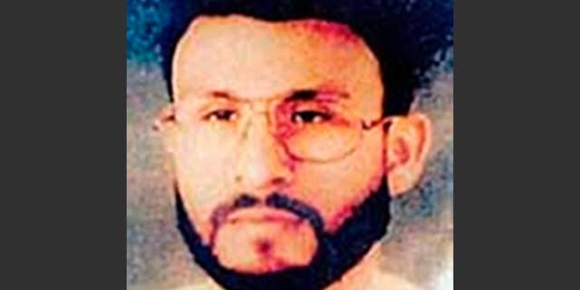 FILE - This undated file photo provided by U.S. Central Command shows Abu Zubaydah at an unknown location. Zubaydah was the CIA’s guinea pig. He was the first high-profile al Qaida terror suspect captured after the Sept. 11 attacks and the first to vanish into the spy agency’s secret prisons, the first subjected to grinding white noise and sleep deprivation tactics and the first to gasp under the simulated drowning of waterboarding. Zubaydah’s stark ordeal became the CIA’s blueprint for the brutal treatment of terror suspects, according to the Senate Intelligence Committee’s report released Tuesday. (AP Photo/U.S. Central Command, File)
