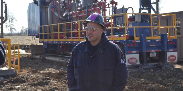 CJ Cutter walks across the drill site, located in Kristin's backyard in West Salem, Ohio during "Blood and Oil."