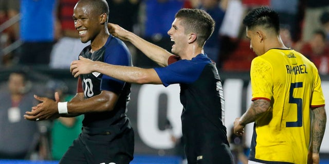 Darlington Nagbe and Christian Pulisic celebrate on Wednesday, May 25, 2016, in Frisco, Texas.