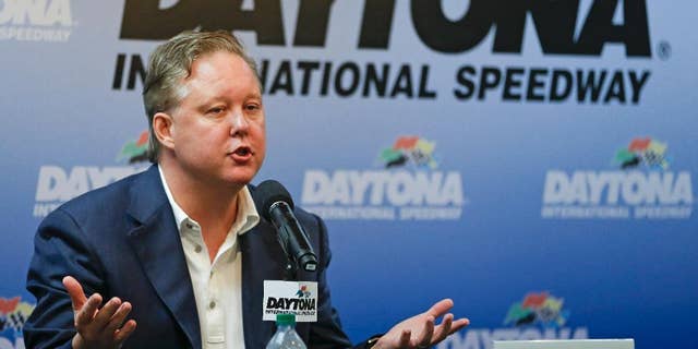 CORRECTS TO BRIAN-Brian France, CEO and Chairman of NASCAR answers questions during a news conference the prior to the Sprint cup Series auto race at Daytona International Speedway in Daytona Beach, Fla., Saturday, July 5, 2014. (AP Photo/John Raoux)
