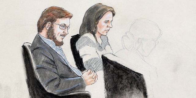 Jan. 20, 2015: In this courtroom sketch, James Holmes, left, and defense attorney Tamara Brady are depicted, as they sit in court on the first day of jury selection in Holmes' trial, at the Arapahoe County Justice Center,  in Centennial, Colo.