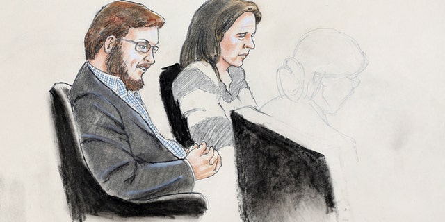 Jan. 20, 2015: In this courtroom sketch, James Holmes, left, and defense attorney Tamara Brady are depicted, as they sit in court on the first day of jury selection in Holmes' trial, at the Arapahoe County Justice Center, in Centennial, Colo.