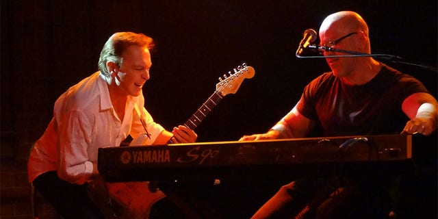 David Cassidy performs with band member and close friend Craig J. Snider in 2015.