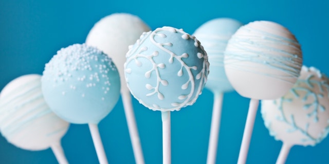 Cake pops decorated in blue and white