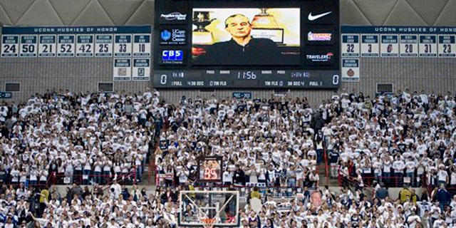 Feb. 25, 2012: Connecticut head coach Jim Calhoun addresses fans prior to an NCAA college basketball game against Syracuse in Storrs, Conn.