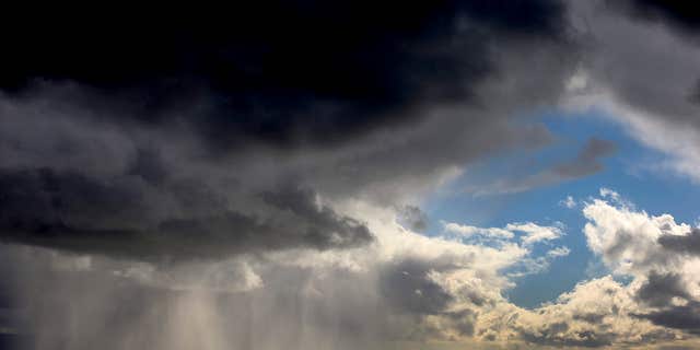 April 7, 2015: Storm clouds and rain move across the San Francisco Bay