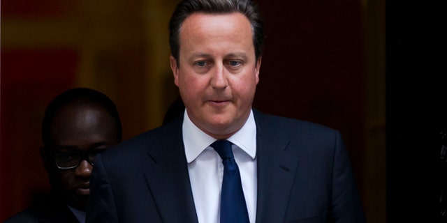 April 29, 2013: Britain's Prime Minister David Cameron leaves 10 Downing Street in London, to be driven to the Houses of Parliament for a debate and vote on Syria.