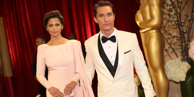 HOLLYWOOD, CA - MARCH 02:  Actor Matthew Conaughey (R) and model Camilla Alves attend the Oscars held at Hollywood &amp; Highland Center on March 2, 2014 in Hollywood, California.  (Photo by Christopher Polk/Getty Images)