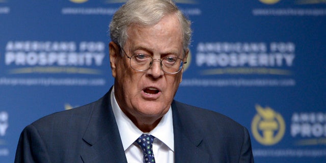 FILE - In this Aug. 30, 2013 file photo, David Koch speaks in Orlando, Fla. The Republican door-knockers are busy selling Pennsylvania Sen. Pat Toomey, and they never mention Donald Trump. Such is the 2016 landscape in battleground across the country, where hundreds of activists tied to the billionaire Koch brothers are eschewing the top of the ticket in favor of protecting the Republican majority in the Senate. (AP Photo/Phelan M. Ebenhack, File)