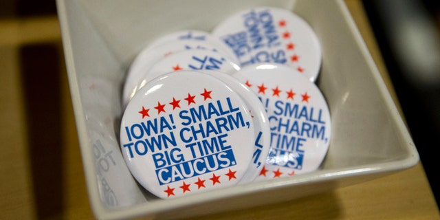 In this Jan. 21, 2016, photo, political buttons are for sale at a gift shop in Des Moines, Iowa.  For some Americans, the promise of political change and disruption has come too slowly, or failed altogether. On the eve of the first voting contest in the 2016 presidential election, these voters are pushing for bolder, more uncompromising action, with an intensity that has shaken both the Republican and Democratic establishment. (AP Photo/Jae C. Hong)