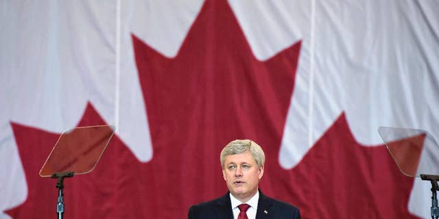 Prime Minister Stephen Harper makes an announcement in Richmond Hill, Canada on Friday, Jan. 30, 2015. (AP Photo/The Canadian Press, Frank Gunn)