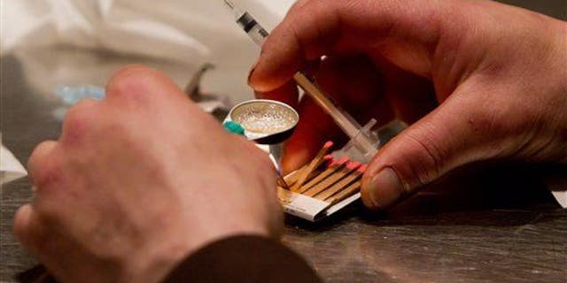 A user is seen at a safe injection clinic in Vancouver.