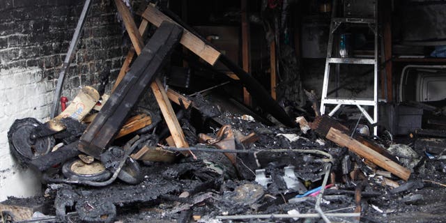 Jan. 10: Burnt debris fills garage in Southeast Washington, where a Washington lobbyist was found dead. Lobbyist Ashley Turton, the wife of a White House adviser Dan Turton, was found dead inside a burning car in the garage.