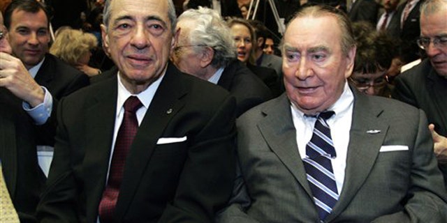 In this Jan. 7, 2009 photo, former New York Govs. Mario Cuomo, left, and Hugh Carey are seen at the Capitol in Albany, N.Y. Carey, who led the rescue effort that brought New York City back from the brink of bankruptcy during its 1975 fiscal crisis, died Sunday, Aug. 7, 2011. He was 92.
