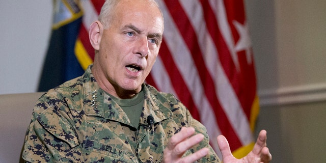Marine Corps Gen. John F. Kelly, Commander of the U.S. Southern Command, gestures as he speaks during an interview with The Associated Press, Tuesday, Jan. 12, 2016, in Miami. Kelly says Cuba will attend an annual Caribbean security conference for the first time in another sign of normal relations between the long-hostile nations. The three-day event co-hosted by U.S. Southern Command will be this month in Jamaica. (AP Photo/Wilfredo Lee)
