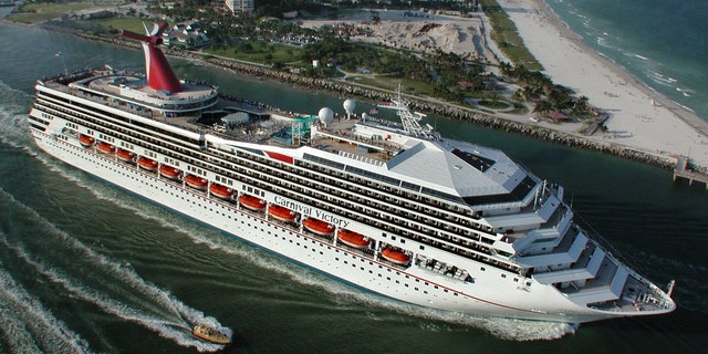 Oct. 15, 2000 - FILE photo: Carnival Cruise Lines ship, the 2,758-passenger Carnival Victory, passes by Miami Beach as it embarks on its inaugural Caribbean voyage. A 6-year-old boy drowned in one of the pools aboard a Carnival ship while at sea, the company said in a statement Monday.