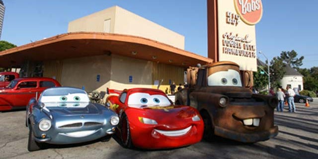 June 17, 2011: British spy Finn McMissile, four-time Piston Cup champion Lightning McQueen and his best pal Mater (life-size remote controlled models based on the characters) from Disney and Pixar's 'Cars 2' roll into Bob's Big Boy for a pit stop in Burbank, Calif.