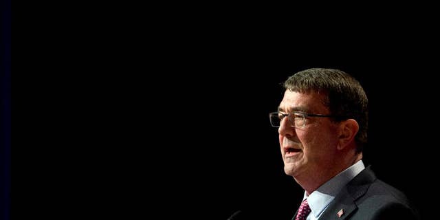 File-This March 6, 2015, file photo shows Defense Secretary Ash Carter, speaking during a ceremonial swearing-in ceremony at the Pentagon. Carter is considering easing some military enlistment standards as part of a broader set of initiatives to better attract and keep quality service members and civilians across the Defense Department. While there are few details yet, Carter is exploring whether to adjust some of the requirements for certain military jobs, such as those involving cyber or high-tech expertise. (AP Photo/Manuel Balce Ceneta)