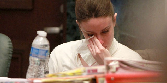 June 9: Casey Anthony reacts to evidence photos showing the skeletal remains of her daughter Caylee Anthony shown during her trial at the Orange County Courthouse in Orlando, Fla. Anthony, 25, is charged with killing her daughter Caylee in the summer of 2008.