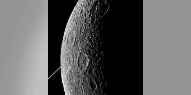 NASA's Cassini imaging scientists processed this view of Saturn's moon Dione, taken during a close flyby on June 16, 2015.