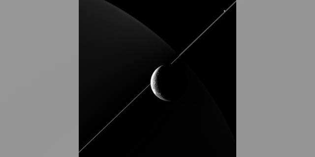 NASA's Cassini imaging scientists processed this view of Saturn's moon Dione, taken during a close flyby on June 16, 2015.