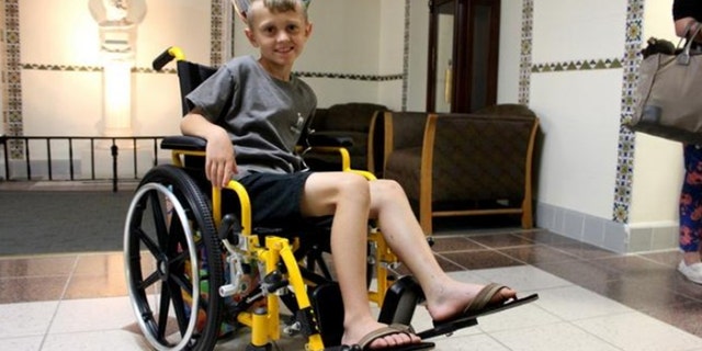Casson Thomas leaving the hospital on Friday.