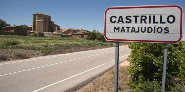 A sign welcomes visitors to Castrillo Matajudios, Spain (Reuters)