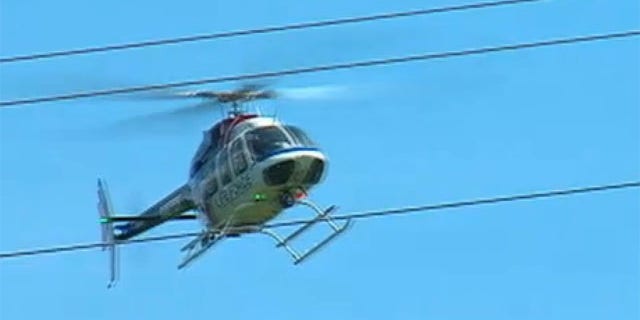 May 27, 2013: A helicopter comes to transport a man to a hospital after he was rescued from a Georgia cave.