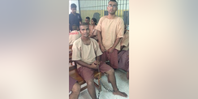 March 2015: Pakistani Christian men sit shackled in the central jail in Bangkok.