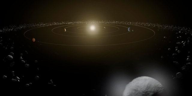 Dwarf planet Ceres is seen in the main asteroid belt, between the orbits of Mars and Jupiter, as illustrated in this undated artist's conception released by NASA.