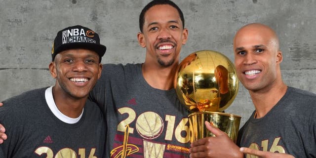 OAKLAND, CA - JUNE 19: James Jones #1, Channing Frye #9 and Richard Jefferson #24 of the Cleveland Cavaliers poses for a portrait after winning the NBA Championship against the Golden State Warriors during the 2016 NBA Finals Game Seven on June 19, 2016 at ORACLE Arena in Oakland, California. NOTE TO USER: User expressly acknowledges and agrees that, by downloading and or using this photograph, User is consenting to the terms and conditions of the Getty Images License Agreement. Mandatory Copyright Notice: Copyright 2016 NBAE (Photo by Jesse D. Garrabrant/NBAE via Getty Images)