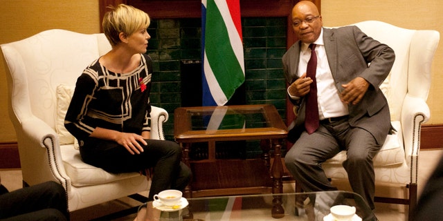 South African President Jacob Zuma, right, meets South African-born Hollywood actress Charlize Theron, left, at his Union Building office in Pretoria, South Africa, ahead of their meeting, to discuss the fight against HIV and AIDS.