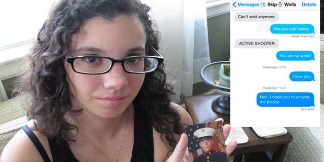 Caroline Dove holds a photo of Marine Corps Lance Cpl. Skip Wells, her boyfriend, in her hands July 17, 2015, at her home in Savannah, Ga. Wells was among four Marines killed July 16, 2015, in an attack at a military training facility in Chattanooga, Tenn. Muhammad Youssef Abdulazeez opened fire Thursday, July 16, 2015, on two U.S. military sites in Chattanooga in an attack that left four Marines dead and raised the specter of terrorism on U.S. soil. He was killed by police.(AP Photo/Russ Bynum)
