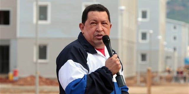 Aug. 9, 2012 - In this photo released by Miraflores Press Office, Venezuela's President Hugo Chavez speaks during a visit to a housing complex at Catia la Mar, Venezuela.