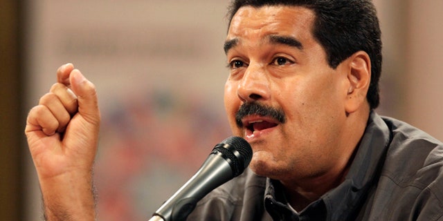 March 13, 2013: Venezuela's acting President Nicolas Maduro speaks at the opening of the Ninth International Book Fair of Venezuela (Filven) which pays tribute to late President Hugo Chavez at the Teresa Carreno theater in Caracas, Venezuela.