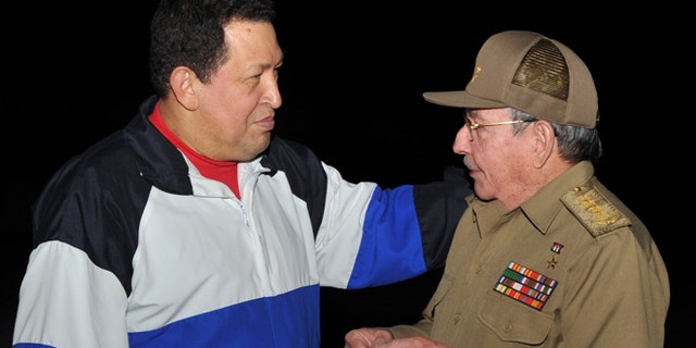Dec. 10, 2012: In this picture released Tuesday, Dec. 11, 2012 by Cuba's state newspaper Granma, Cuba's President Raul Castro, right, receives Venezuela's President Hugo Chavez at the Jose Marti International airport in Havana, Cuba.